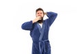 Feeling sleepy. Sleepy hipster yawn isolated on white. Bearded man look sleepy in bathrobe. Early morning time. Good Royalty Free Stock Photo