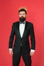 Feeling superior. Man bearded guy in tuxedo golden crown symbol of monarchy. King ceremony. King attribute. Narcissistic Royalty Free Stock Photo