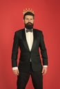 Feeling superior. Man bearded guy in tuxedo golden crown symbol of monarchy. King ceremony. King attribute. Narcissistic Royalty Free Stock Photo