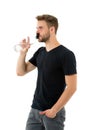 Feeling thirsty. Man athlete hold water bottle. Guy drink water on white background. Man care health and water balance Royalty Free Stock Photo