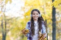 Feeling totally free. happy kid wear headphones. teen girl listen music on the way to school. child walk in autumn