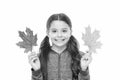 Feelings of comfort and nostalgia we experience in autumn are hard to express. Kid girl hold fallen maple leaves. Happy Royalty Free Stock Photo