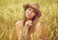 She feels at home in nature. a young woman in a wheat field. Royalty Free Stock Photo