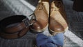 Fees the groom. The morning of the groom. Boots, butterfly, belt Wedding details. Male casual outfits. Top view, flat lay