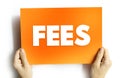 FEES - the price one pays as remuneration for rights or services, text concept on card Royalty Free Stock Photo