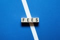 Fees word concept on cubes Royalty Free Stock Photo