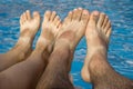 Feet agains blue water Royalty Free Stock Photo