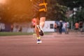 The feet of an athlete running outdoors at the racetrack. Fit young man is running on the race track. Male runner in sportswear Royalty Free Stock Photo