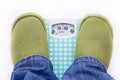 Feet on a bathroom scale showing weight Royalty Free Stock Photo