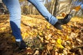 Feet in boots yellow leaves Royalty Free Stock Photo