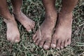 The feet of boy on the grass Royalty Free Stock Photo