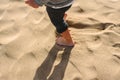 Feet of boy walking on the sand of the beach Royalty Free Stock Photo