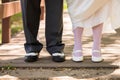 The feet of a bride and groom. Royalty Free Stock Photo