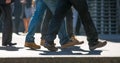 Feet of business people walking in the City of London. Busy modern life concept.