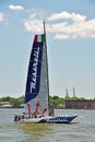 Racing yacht VOR70 Maserati sail sailing cruise cruising through Hudson River in New York City Royalty Free Stock Photo