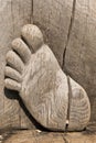 Close - up of feet carved from wood