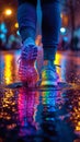 Feet in colorful sneakers in the rain