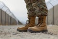 feet in combat boots at a military base line Royalty Free Stock Photo