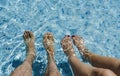 Feet of a couple of men and women. Royalty Free Stock Photo