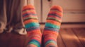feet covered in cozy striped woollen socks