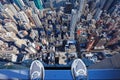 Feet on the edge of tall building Royalty Free Stock Photo