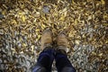 Feet in fallen leaves