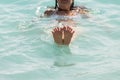 Feet with funny fingers Woman enjoying swimming in the sea