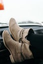 Feet of the girl in the car Royalty Free Stock Photo