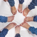 Feet of girls in a circle