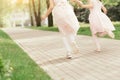 feet of girls running on the trail. two little girls are running Royalty Free Stock Photo