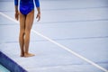 Feet on gymnastics floor