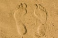 Feet imprint in sand Royalty Free Stock Photo