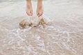 Feet of jumping boy at the beach Royalty Free Stock Photo