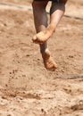 Feet and legs of a boy beach volleyball player Royalty Free Stock Photo