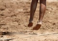 Feet and legs of a boy beach volleyball player Royalty Free Stock Photo