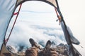 Feet Man relaxing enjoying clouds mountains