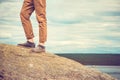 Feet man standing on rocky mountain outdoor Royalty Free Stock Photo