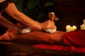 Feet massage with Thai reflexology. Cropped shot of foot reflexology.