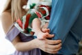 Feet of a newborn baby in the hands of parents. Happy Family oncept. Mum and Dad hug their baby`s legs Royalty Free Stock Photo