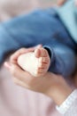 Feet of newborn baby on mother`s palm Royalty Free Stock Photo