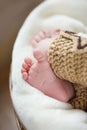 Feet of a newborn baby sleeping on white blanket Royalty Free Stock Photo