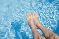 Feet Over the Swimming Pool Royalty Free Stock Photo