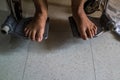 Feet of patient sitting on wheelchair