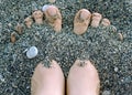 Feet in the pebbles Royalty Free Stock Photo