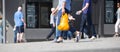 Feet of pedestrians walking on the crosswalk in Oxford street, London. Modern life, travel and shopping concept. UK, London Royalty Free Stock Photo