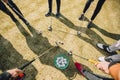 The feet of people playing golf. Sticks, lawn and balls Royalty Free Stock Photo