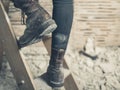 Feet of person on stepladder Royalty Free Stock Photo