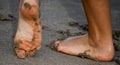 Feet Playing in Wet Sand Royalty Free Stock Photo