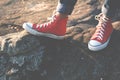 Feet red sneaker a girl in nature and relax time Royalty Free Stock Photo