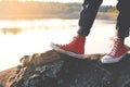 Feet red sneaker a girl in nature and relax time Royalty Free Stock Photo